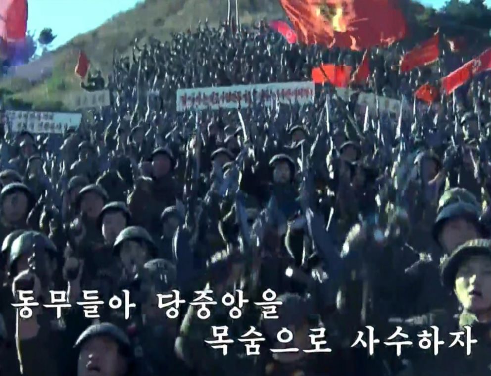 PHOTO: Subtitles help viewers sing along to propaganda songs on Korean Central Television. "Comrades, risk your lives to guard the Central Party," one song implored last week.