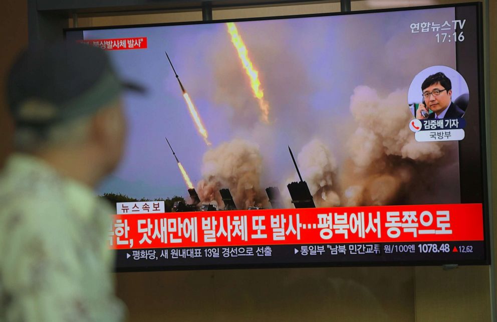 PHOTO: People watch a television news programme showing file footage of North Korea's projectile weapons, at a railway station in Seoul, May 9, 2019.