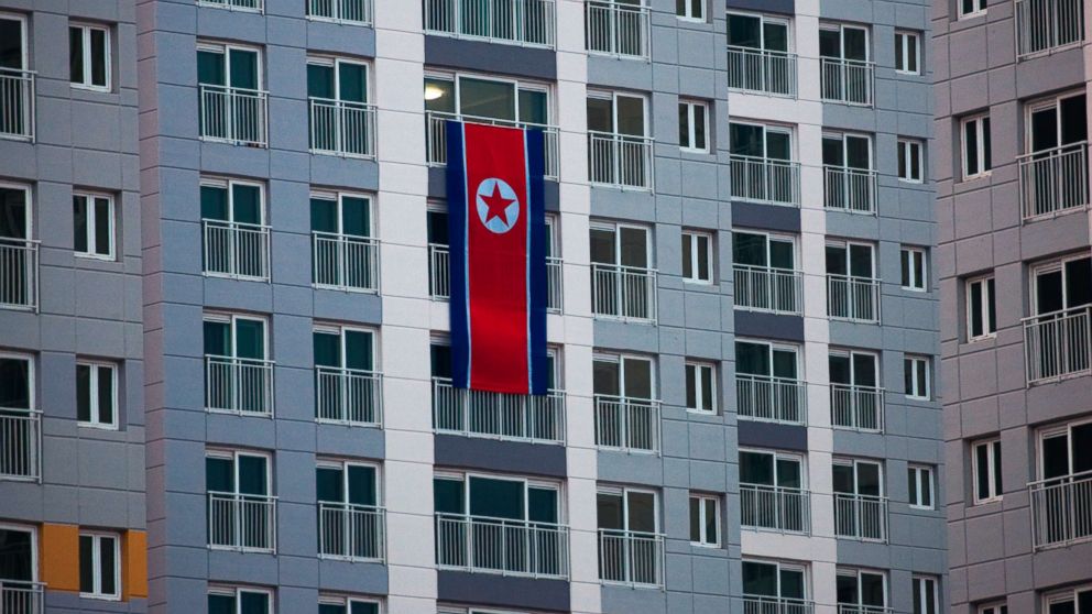 PHOTO: A large North Korean flag hangs from an apartment building at the Olympic Village prior to the 2018 Winter Olympics in Gangneung, South Korea, Feb. 2, 2018. 