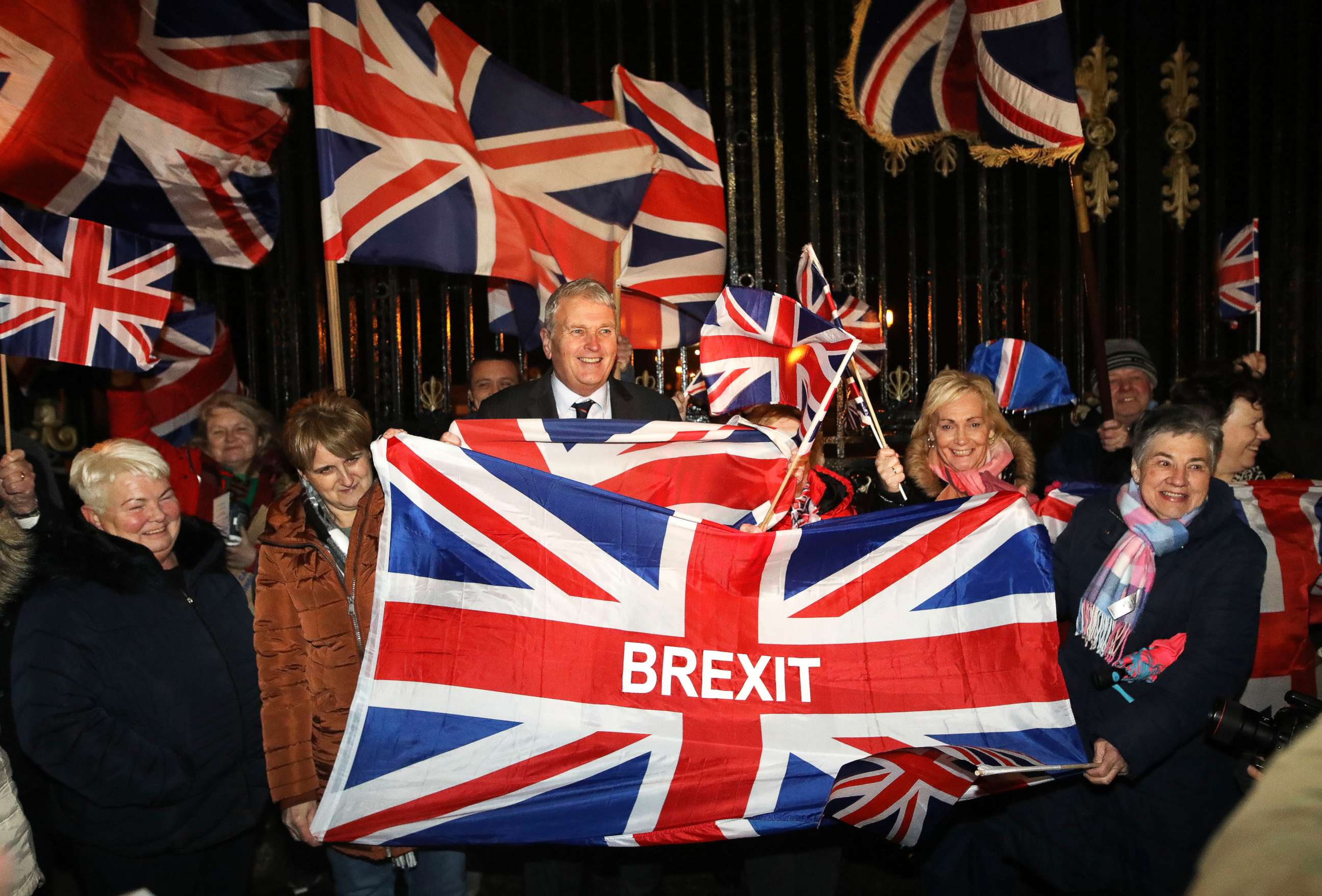 PHOTO: Brexit supporters celebrate during a rally outside Stormont in Belfast, Northern Ireland as Britain left the European Union on Friday, Jan. 31, 2020. 