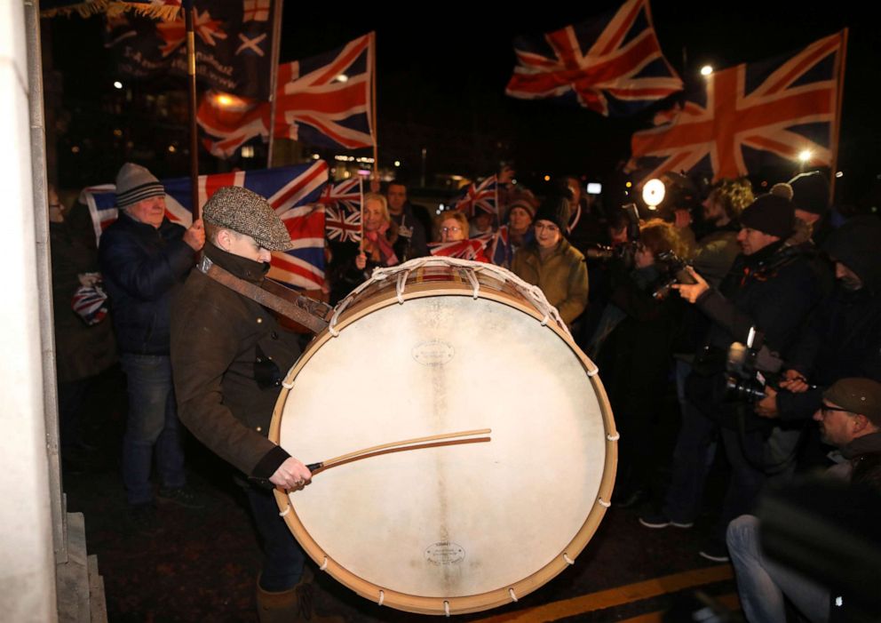 PHOTO: Brexit supporters celebrate during a rally outside Stormont in Belfast, Northern Ireland as Britain left the European Union on Friday, Jan. 31, 2020.