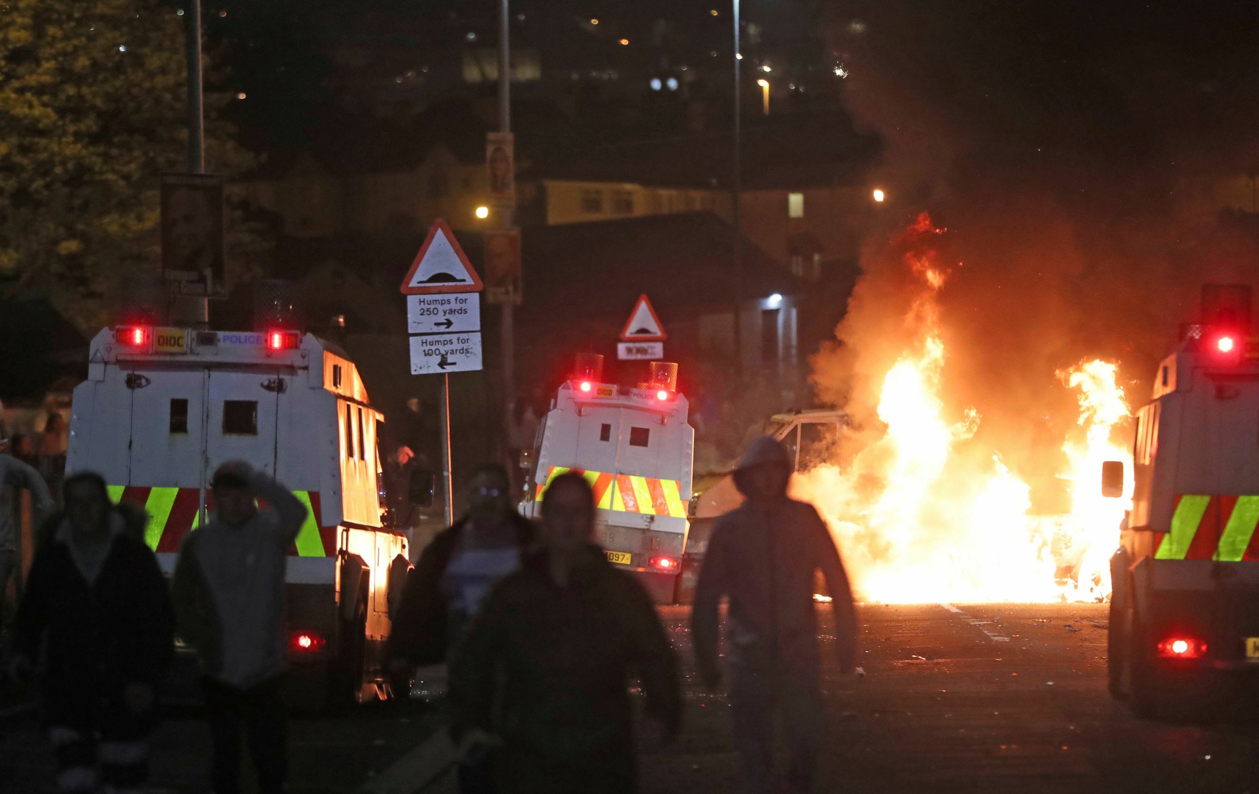 PHOTO: A car burns after petrol bombs were thrown at police in Creggan, Londonderry, in Northern Ireland, Thursday, April 18, 2019.
