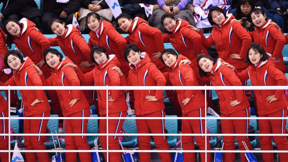 PHOTO: North Korea's cheerleaders leading cheers before the women's preliminary round ice hockey match between Switzerland and the Unified Korean team at the Kwandong Hockey Centre in Gangneung, South Korea, Feb. 10, 2018.