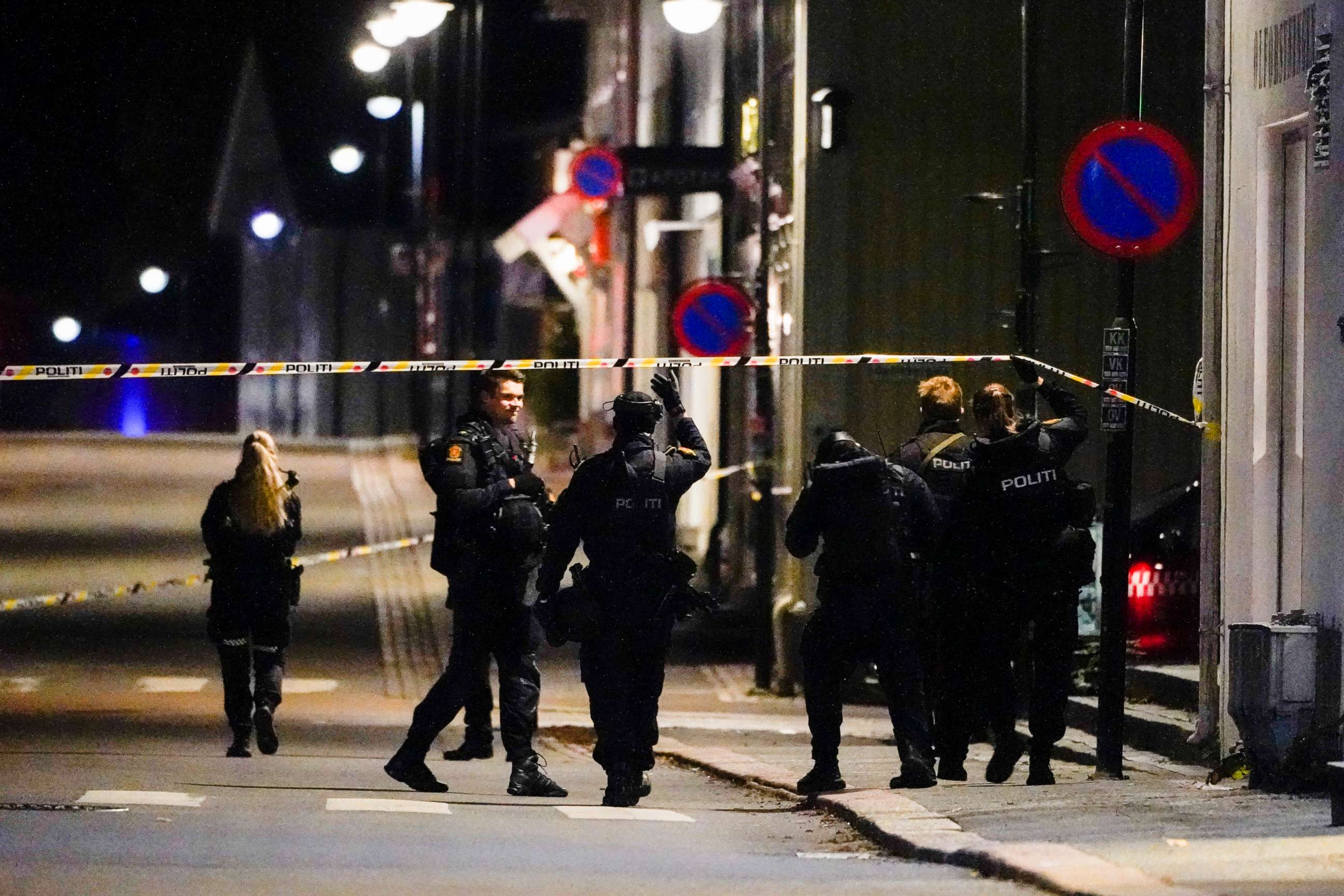 PHOTO: Police stand at the scene after an attack in Kongsberg, Norway, Wednesday, Oct. 13, 2021. Several people have been killed and others injured by a man armed with a bow and arrow in a town west of the Norwegian capital, Oslo.