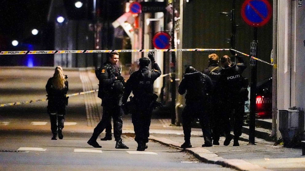 PHOTO: Police stand at the scene after an attack in Kongsberg, Norway, Wednesday, Oct. 13, 2021. Several people have been killed and others injured by a man armed with a bow and arrow in a town west of the Norwegian capital, Oslo.