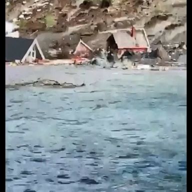 Mudslide sweeps houses into the sea in Norway.