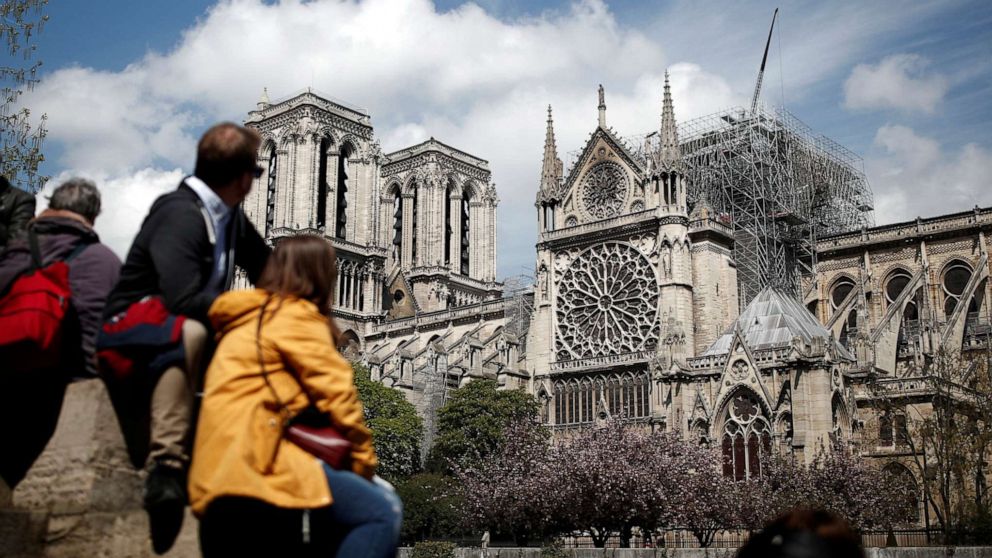 France's prime minister has announced "an international architecture competition" to rebuild the iconic arrow-like spire atop the Notre Dame Cathedral in Paris, which caught fire on Monday evening.