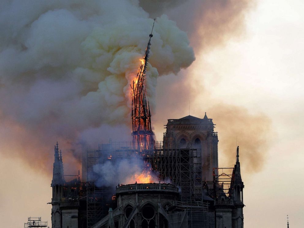PHOTO: The steeple of the landmark Notre-Dame Cathedral collapses as the cathedral is engulfed in flames in Paris, April 15, 2019.