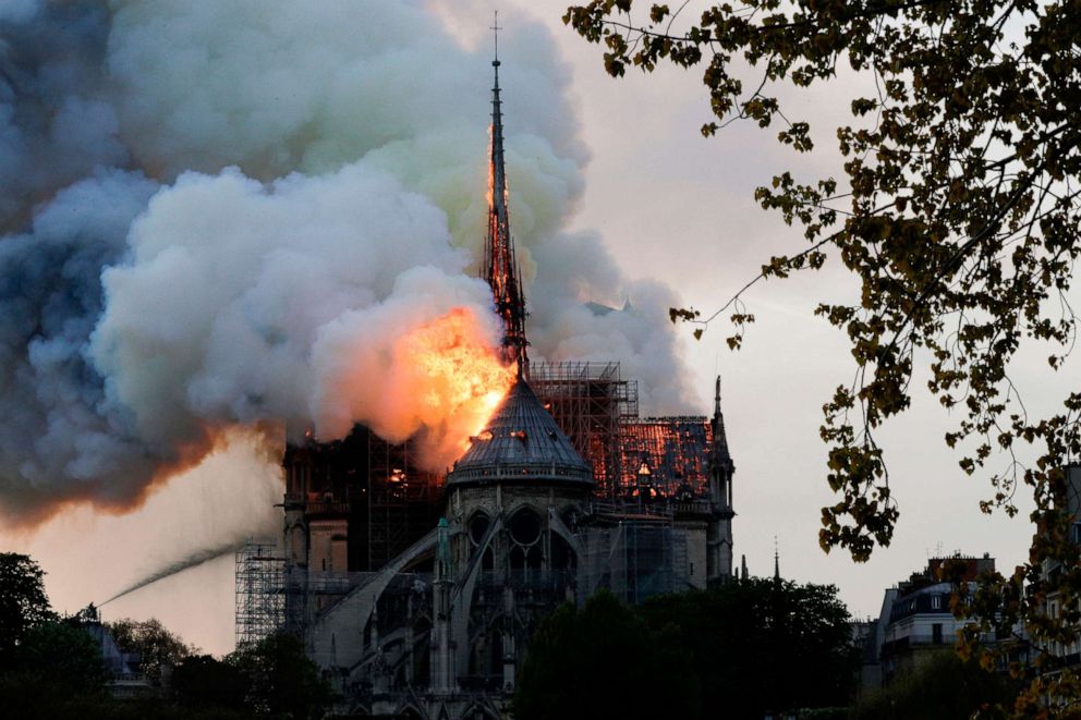 Flames are seen from the roof at Notre-Dame Cathedral in Paris, April 15, 2019.