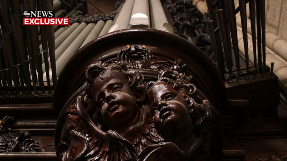 PHOTO: Carved cherubs decorate the pipe organ that survived the fire in Paris' Notre Dame cathedral.