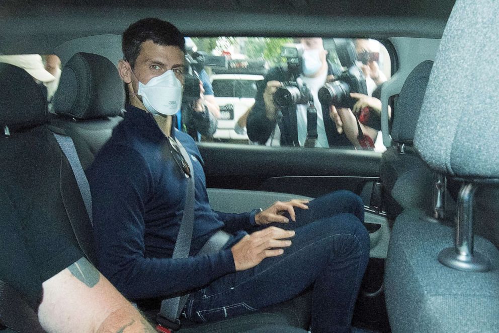 PHOTO: Serbian tennis player Novak Djokovic departs from the Park Hotel government detention facility before attending a court hearing at his lawyers office in Melbourne, Australia, Jan. 16, 2022.