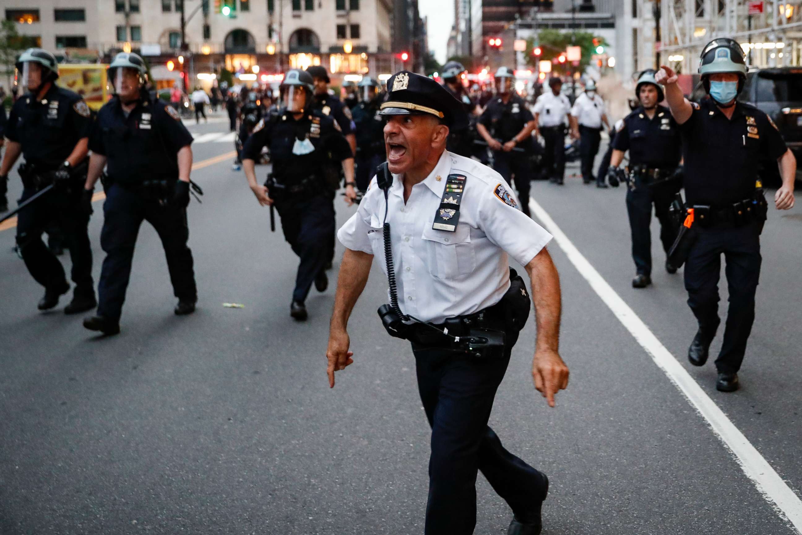 PHOTO: NYPD officers move in to arrest protesters for violating curfew beside the iconic Plaza Hotel on 59th Street, June 3, 2020, in the Manhattan borough of New York City.