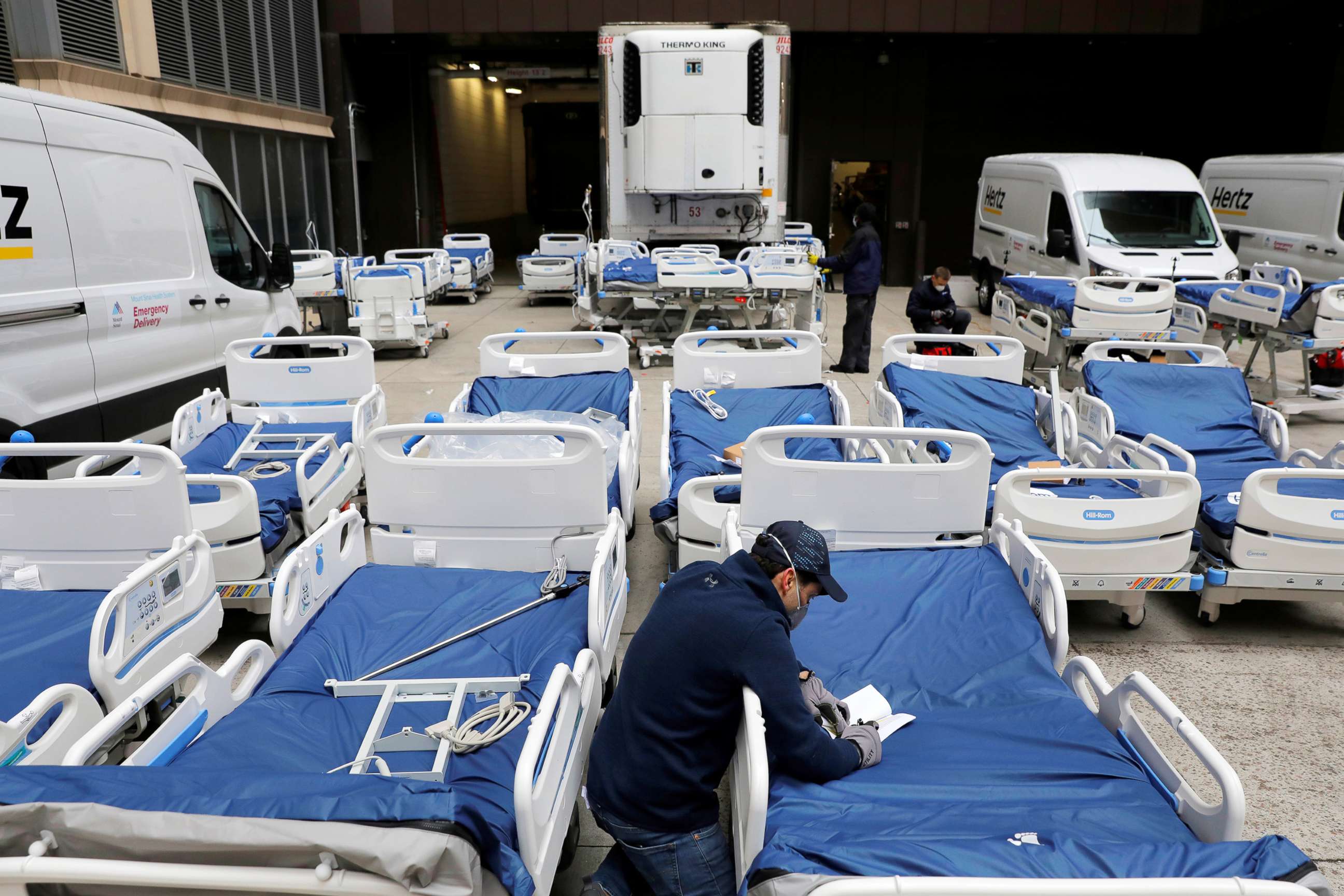 PHOTO: A worker checks a delivery of 64 hospital beds from Hillrom to The Mount Sinai Hospital during the outbreak of the coronavirus disease (COVID-19) in New York City, U.S., March 31, 2020.