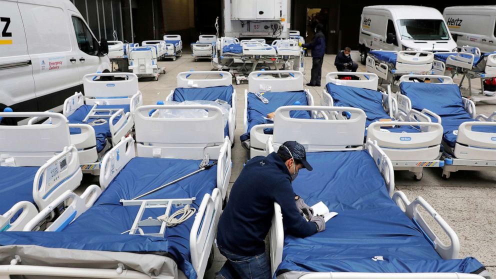 PHOTO: A worker checks a delivery of 64 hospital beds from Hillrom to The Mount Sinai Hospital during the outbreak of the coronavirus disease (COVID-19) in New York City, U.S., March 31, 2020.