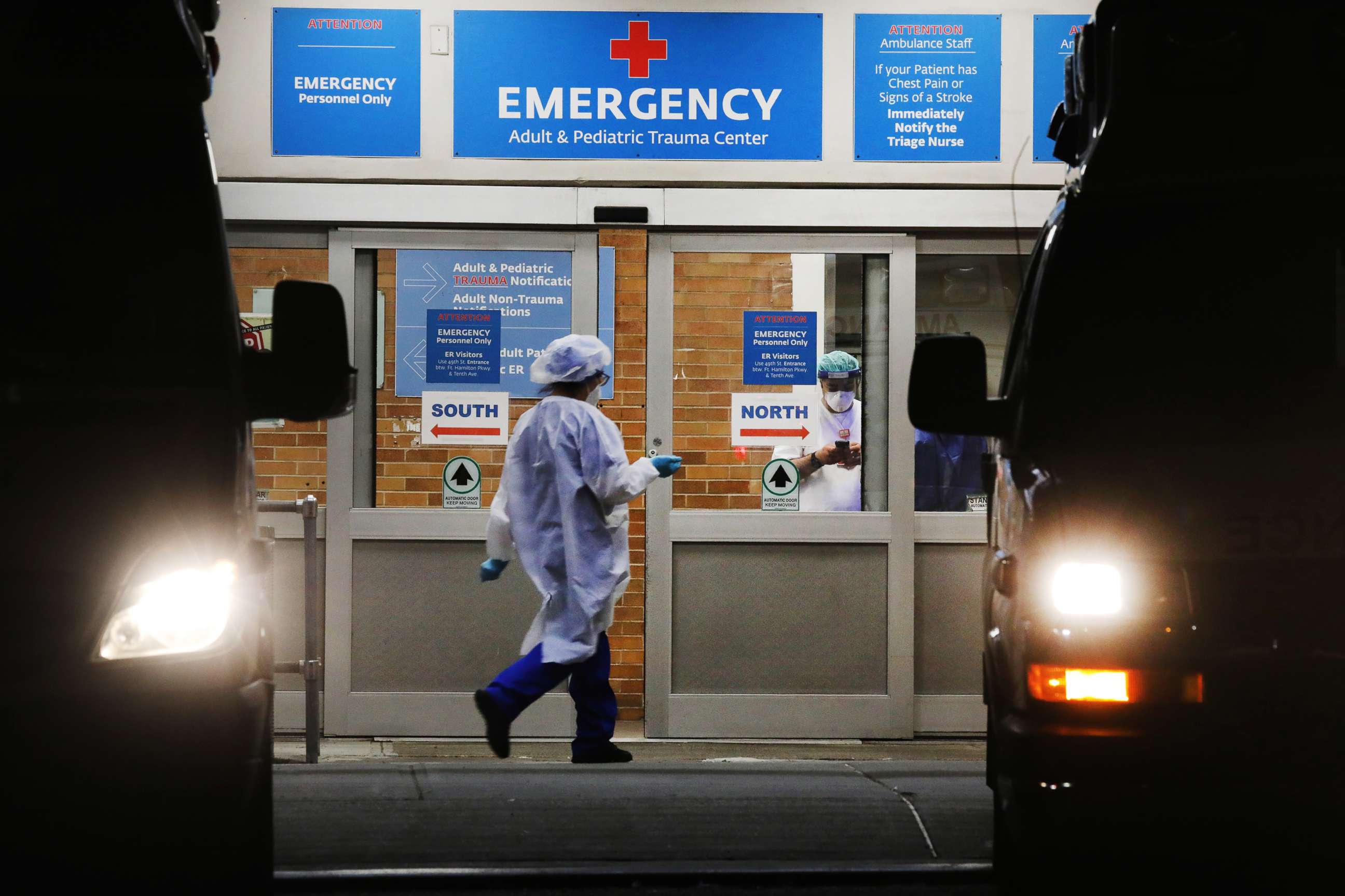 PHOTO: Medical workers walk outside of a special coronavirus intake area at Maimonides Medical Center, May 4, 2020 in the Brooklyn borough of New York City.