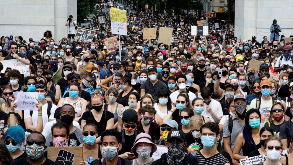 PHOTO: Demonstrators gather at Washington Square Park, during a protest against the death in Minneapolis police custody of George Floyd, in New York City, June 6, 2020.