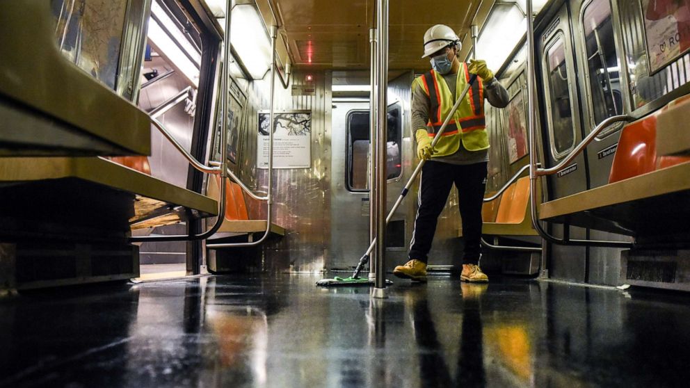 PHOTO: A cleaning crew disinfects a New York City subway train on May 4, 2020 in New York City. 