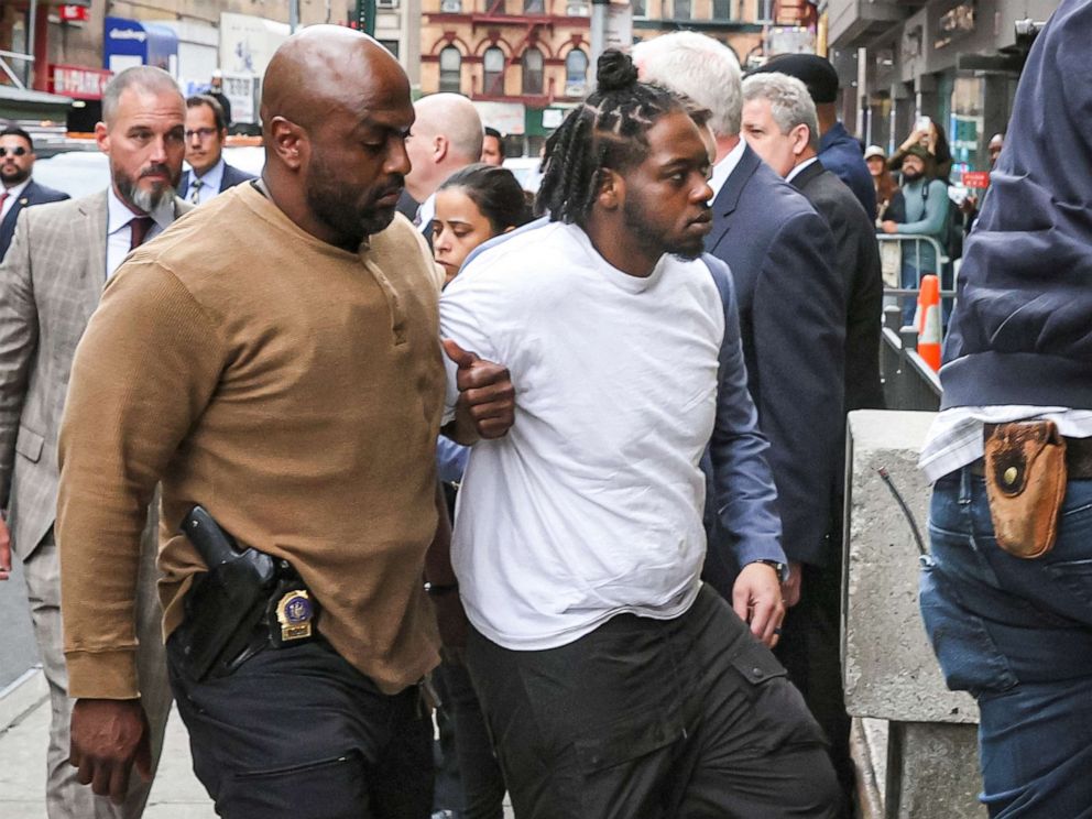 PHOTO: New York Subway shooting suspect Andrew Abdullah is escorted by NYPD Detectives in to a Police Precinct in New York City, May 24, 2022.