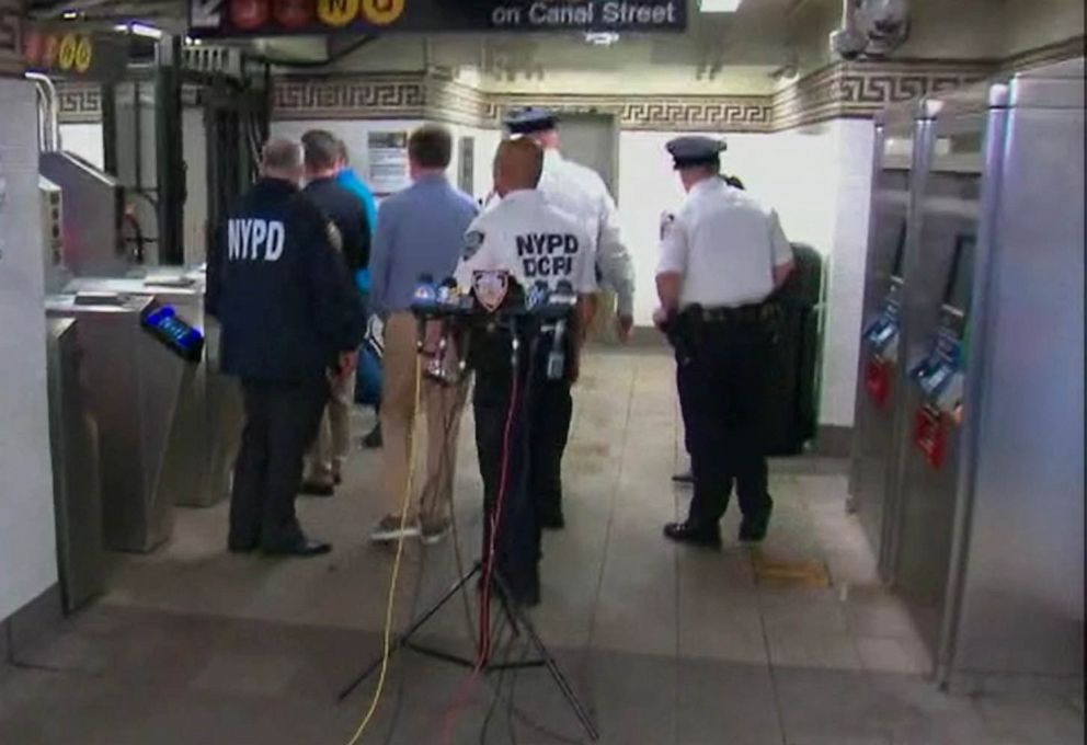 PHOTO: Law enforcement hold a press conference after a shooting incident on the Q Subway train at the Canal Street station in New York, May 22, 2022.