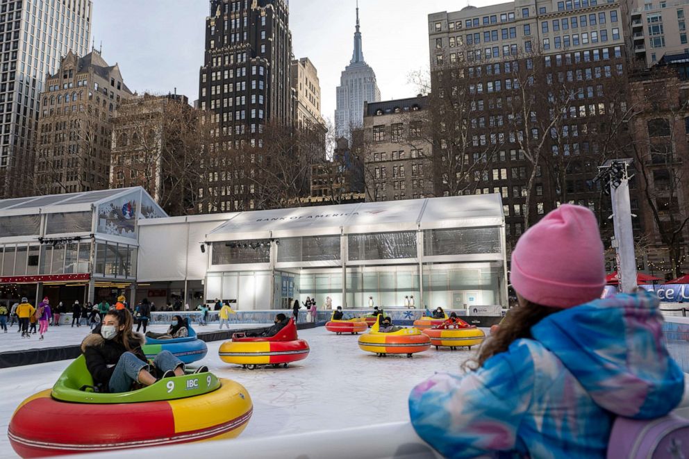 PHOTO: People ride ice-bumper cars at the ice rink in Bryant Park on Jan. 14, 2022, in New York City.