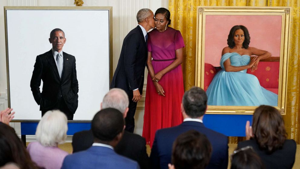 PHOTO: Former President Barack Obama kisses his wife former first lady Michelle Obama after they unveiled their official White House portraits during a ceremony for the unveiling in the East Room of the White House, Sept. 7, 2022.