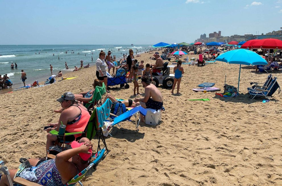 PHOTO: People gather at the beach in Ocean City, Md., on July 3, 2020.