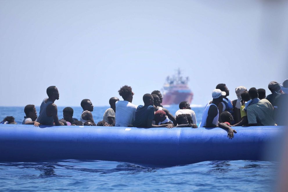 PHOTO: A handout photo dated 12 August 2019 and  made available by Doctors Without Borders (MSF) on 19 August 2019, showing migrants on a rubber dinghy waiting for their rescue by the rescue vessel Ocean Viking off the coast of Libya in the Mediterranean.