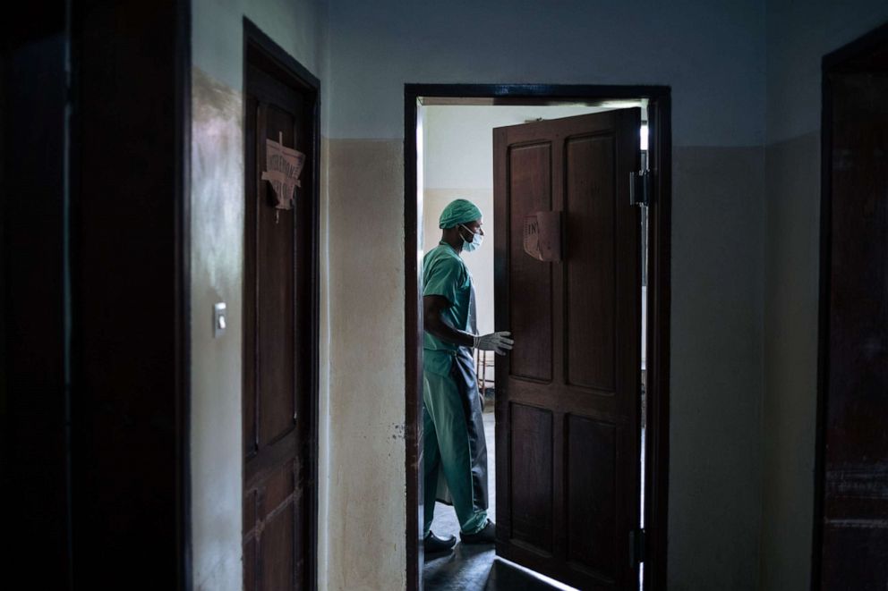 PHOTO: A nurse from Oicha Hospital cares for seriously injured people after an attack by unknown assailants in the eastern Democratic Republic of the Congo, Jan. 29, 2020.