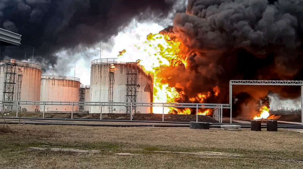 PHOTO: This handout photo released by the Russian Emergency Ministry Press Service on April 1, 2022, shows a fire at an oil depot in Belgorod, Russia.