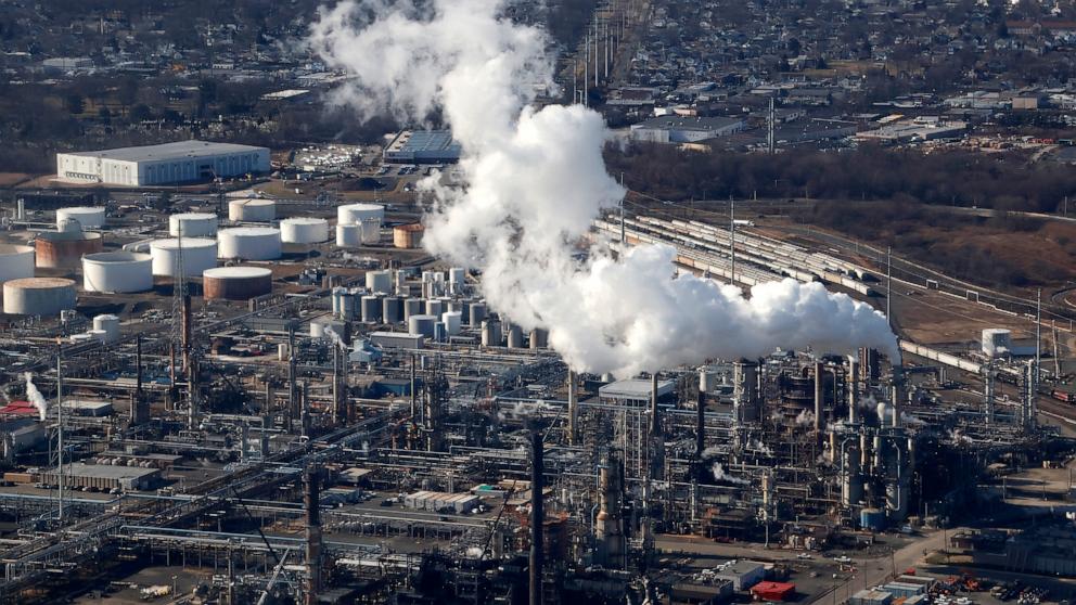 PHOTO: In this Feb. 6, 2024, file photo, an emission comes out of a smoke stack at an oil refinery in New Jersey.