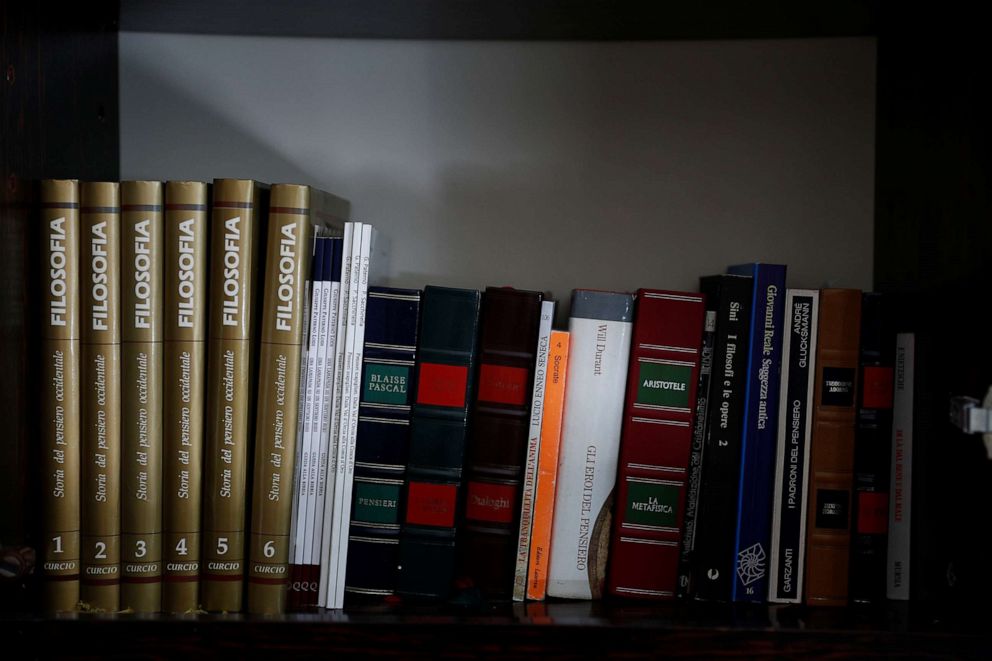 PHOTO: Philosophy books belonging to Giuseppe Paterno, 96, Italy's oldest student, stand on a shelf, a day before he graduates from The University of Palermo with an undergraduate degree in history and philosophy in Palermo, Italy, July 28, 2020. 