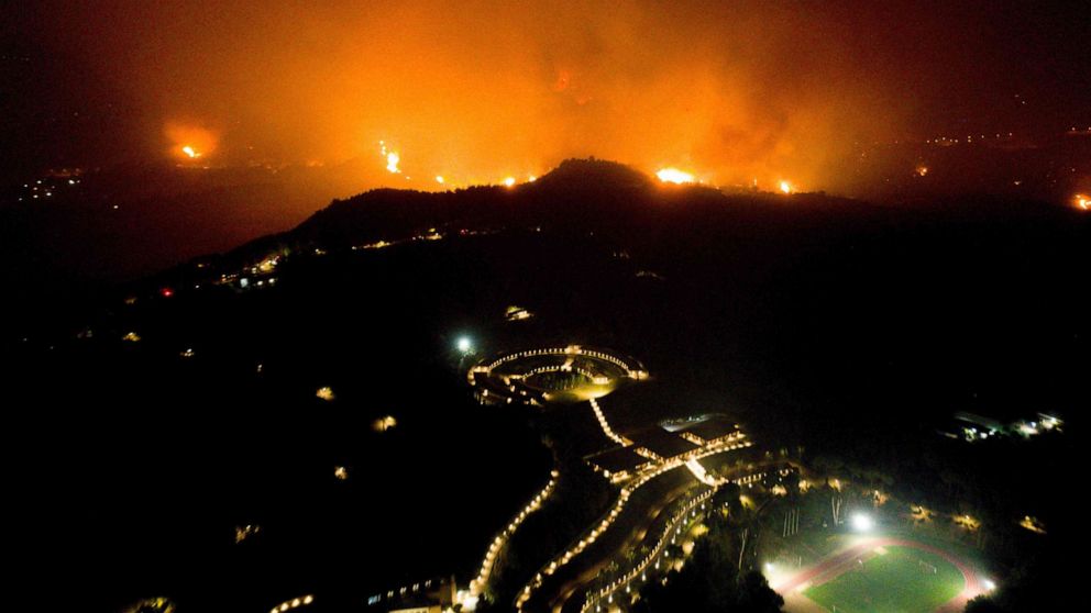 PHOTO:A wildfire approaches the Olympic Academy in ancient Olympia in western Greece, Aug. 4, 2021.
