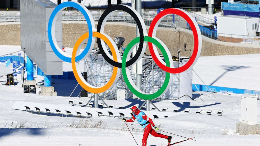 PHOTO: A athlete skis past a Olympic rings logo during the Cross-Country Skiing training session ahead of Beijing 2022 Winter Olympic Games, Feb. 1, 2022, in Beijing.