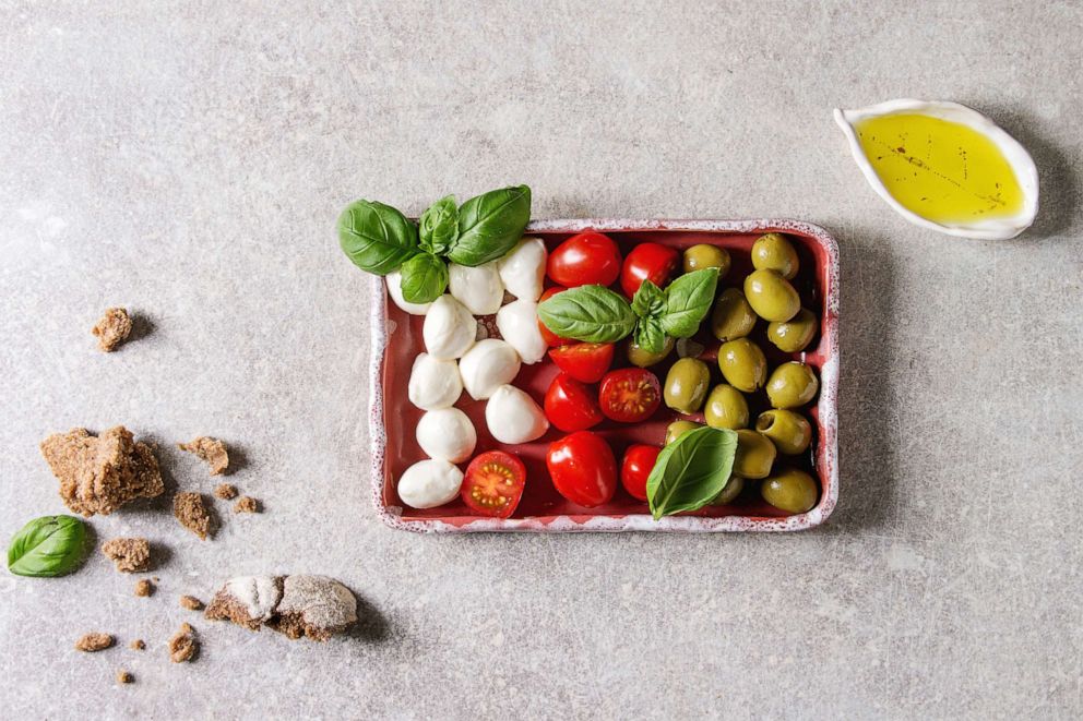 PHOTO: Mozzarella, cherry tomatoes, olives antipasto appetizers.