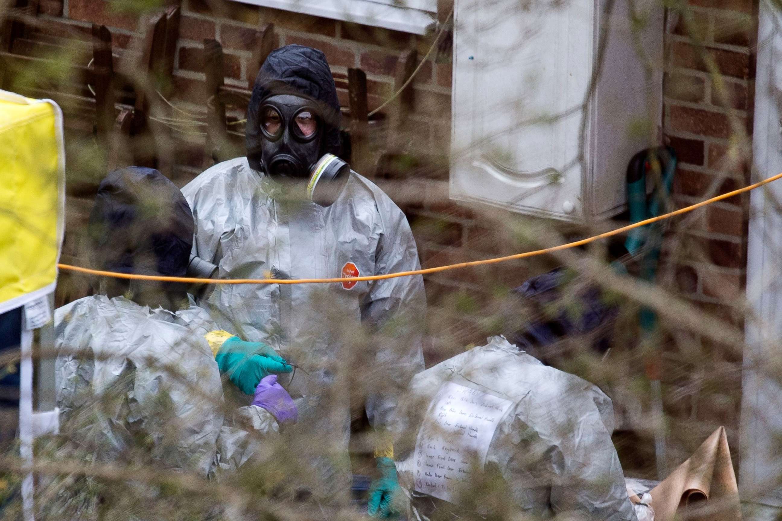 PHOTO: A team believed to be from the Organisation for the Prohibition of Chemical Weapons inspects the back garden of house on the road where former Russian spy Sergei Skripal lived in Salisbury Wiltshire, Britain, March 22, 2018.