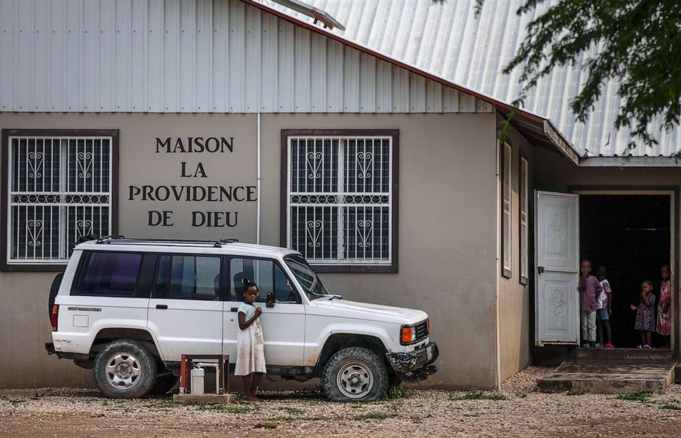 PHOTO: Children stand in the courtyard of the Maison La Providence de Dieu orphanage in Ganthier, Croix-des-Bouquets, Haiti, Oct. 17, 2021, where a gang abducted 17 missionaries from a U.S.-based organization. 