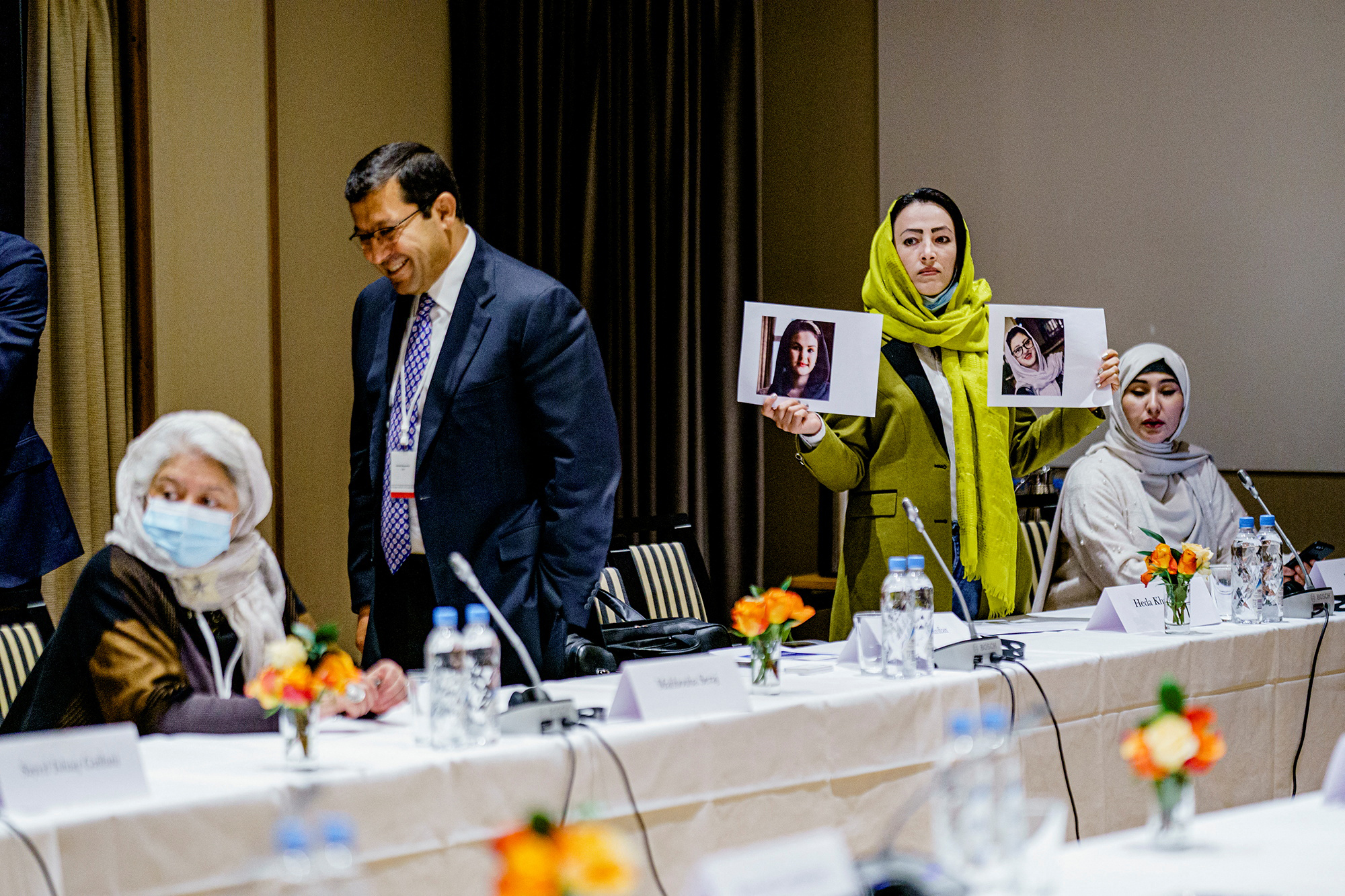PHOTO: Afghan Women's Network Representative Mahbouba Seraj, Chief Executive Officer of Ghazanfar Goup Ismail Ghazanfar and Afghanistan Civil Society Representative Hoda Khamosh attend a meeting at the Soria Moria hotel in Oslo, Jan. 24, 2022.  