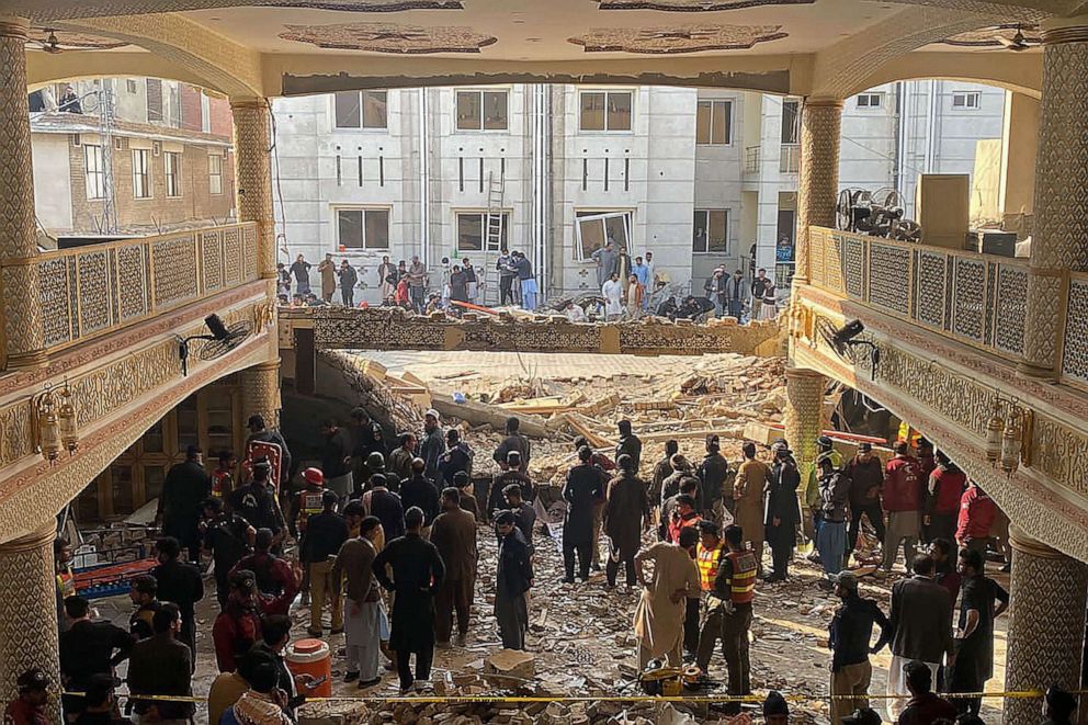 PHOTO: Security officials inspect the site of a mosque blast inside the police headquarters in Peshawar, Jan. 30, 2023.
