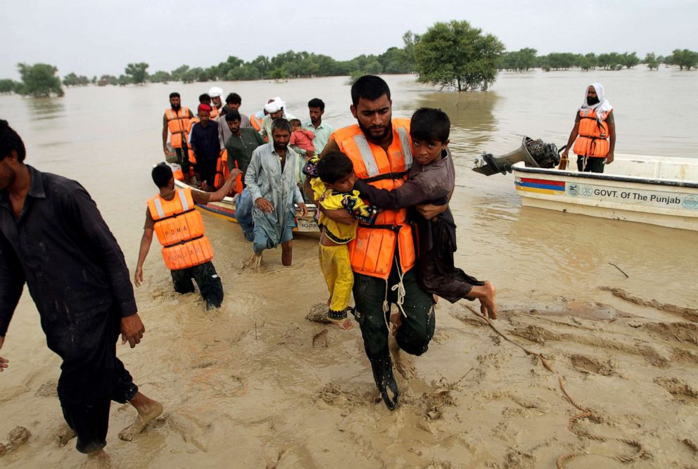 PHOTO: Army troops evacuate people from a flood-hit area in Rajanpur, district of Punjab, Pakistan, Aug. 27, 2022. 