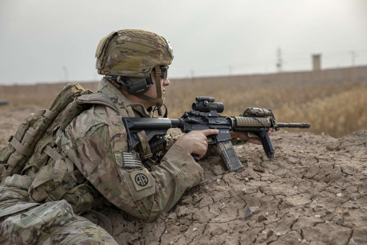 PHOTO: A U.S. Army paratrooper assigned to the 82nd Airborne Division pulls security during a base defense exercise on Camp Taji, Iraq, Jan. 19, 2020.
