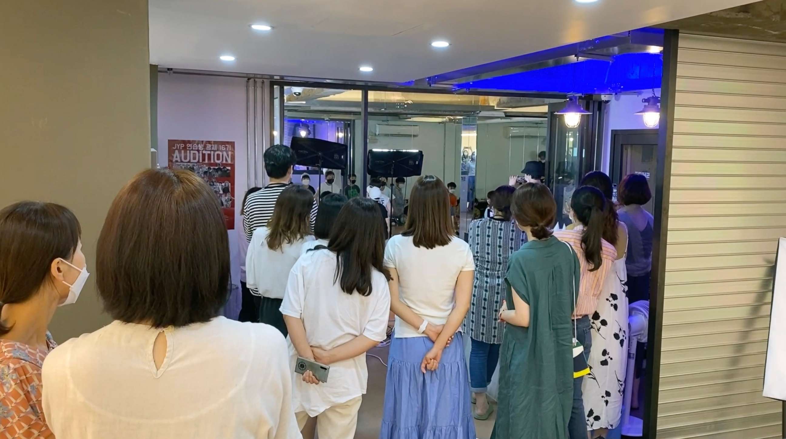 PHOTO: Parents watch their children learn K-pop dance at Shine Dance Academy in Seoul, June 25, 2021.