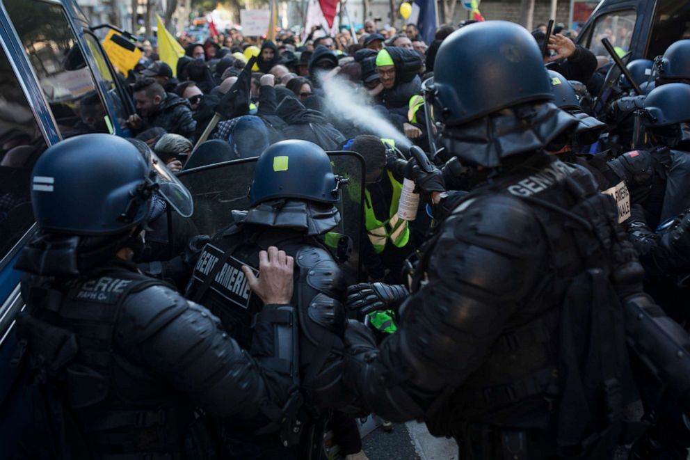 PHOTO: Police use pepper spray during a yellow vest demonstration marking the one year anniversary of the movement in Marseille, southern France, Saturday, Nov. 16, 2019.