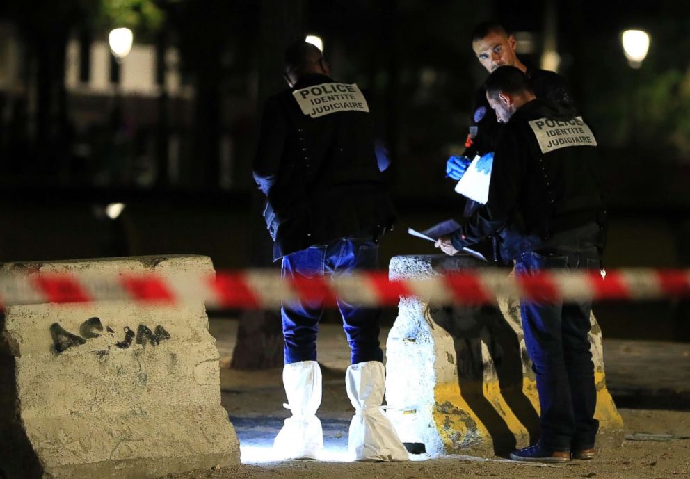 PHOTO: Police investigators work on the scene after seven people were wounded in knife attack downtown Paris, Sept. 10, 2018.