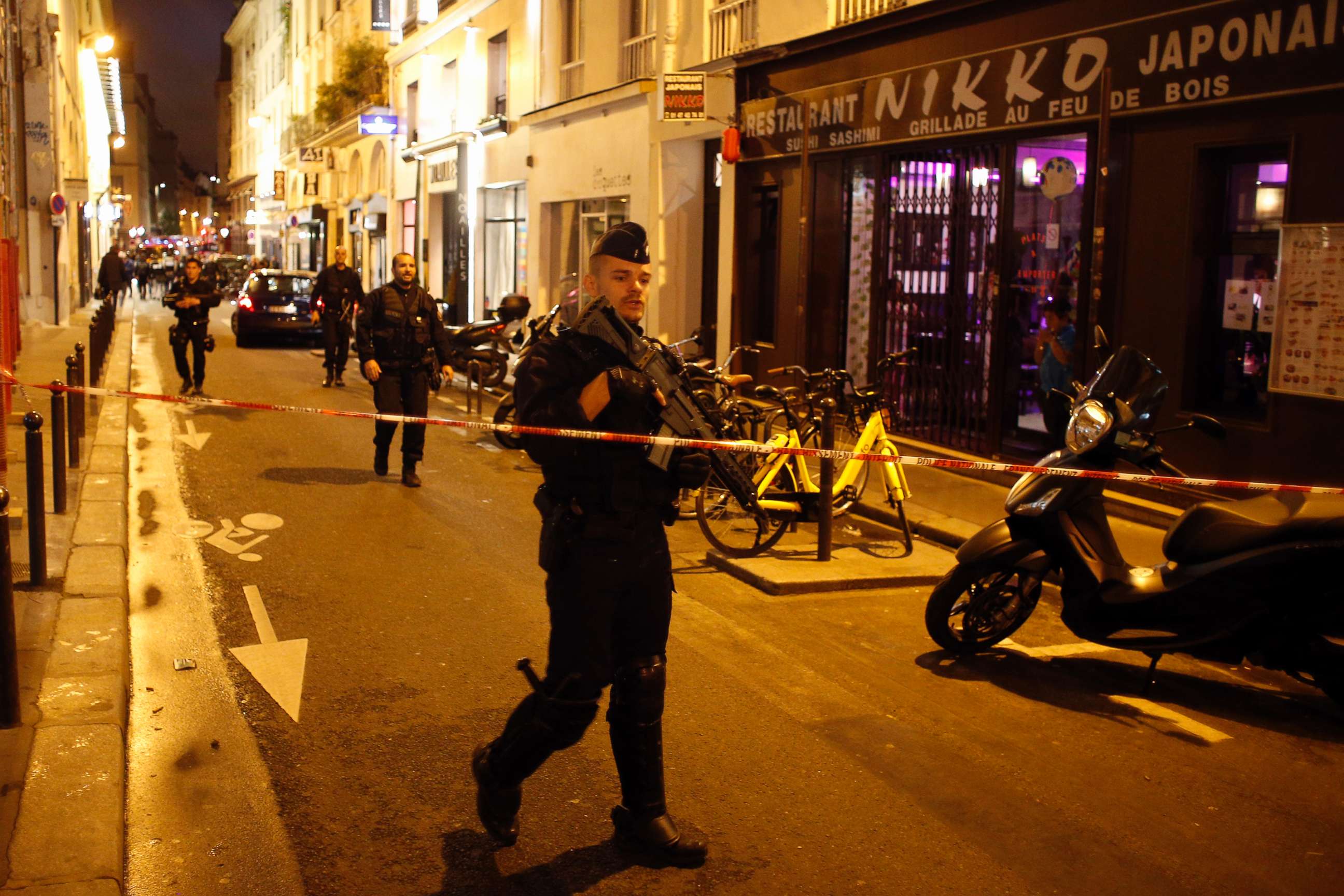 PHOTO: A police officer cordons off the area after a knife attack in central Paris, May 12, 2018.