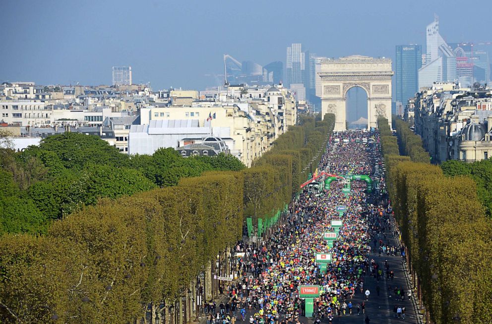PHOTO: Thousands of runners compete in the 43rd Paris Marathon on April 14, 2019, in Paris.