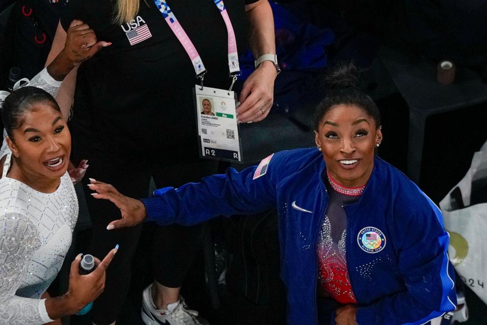 PHOTO: Silver medalist Simone Biles the U.S. and bronze medalist, Jordan Chiles of the U.S. watch the scoreboard during the women's artistic gymnastics individual floor exercise final at the 2024 Paris Olympics, Aug. 5, 2024.