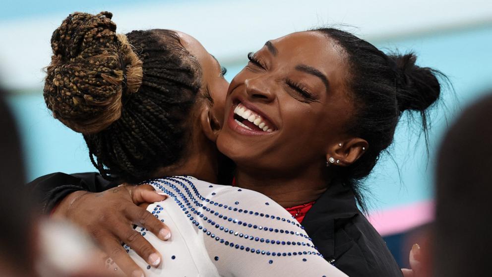 PHOTO: Gold medalist Simone Biles of the U.S. hugs silver medalist Rebeca Andrade of Brazil after the artistic gymnastics women's vault final at the 2024 Paris Olympics, Aug. 3, 2024. Final