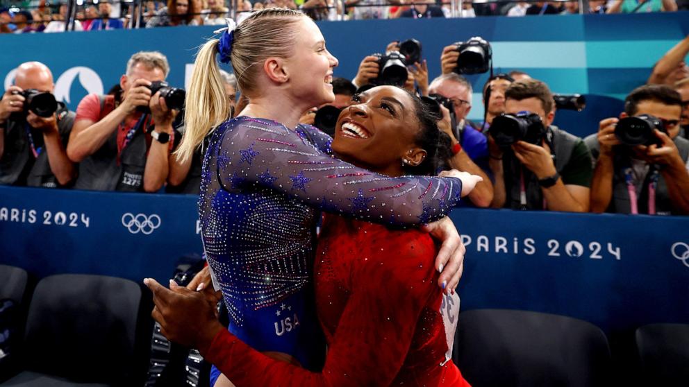 PHOTO: Gold medalist Simone Biles of the U.S. hugs teammate, bronze medalist Jade Carey after the artistic gymnastics women's vault final at the 2024 Paris Olympics, Aug. 3, 2024.