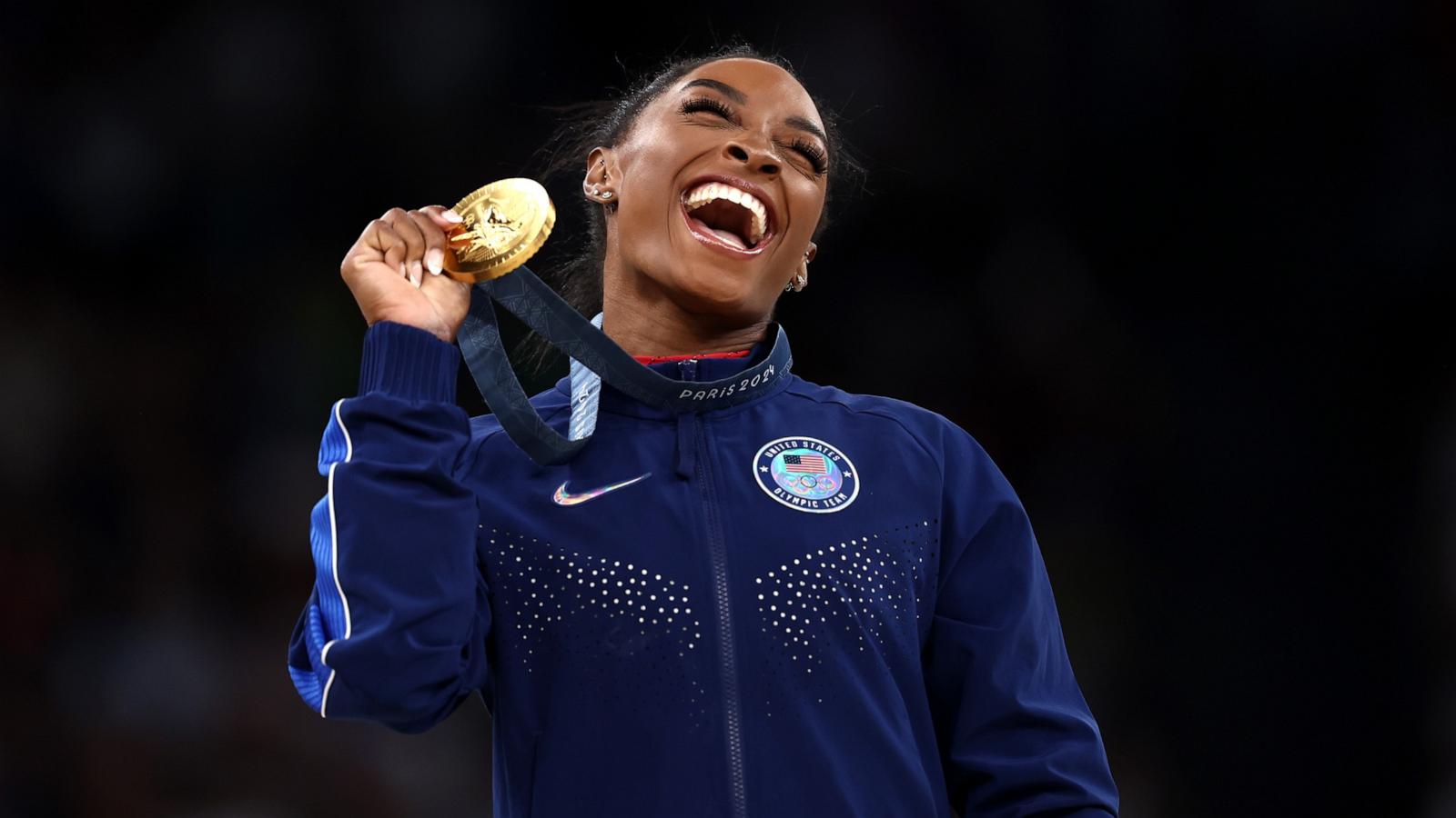 PHOTO: Simone Biles of the U.S. celebrates with her gold medal after winning the artistic gymnastics women's vault final at the 2024 Paris Olympics, Aug. 3, 2024.