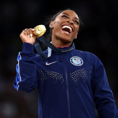 PHOTO: Simone Biles of the U.S. celebrates with her gold medal after winning the artistic gymnastics women's vault final at the 2024 Paris Olympics, Aug. 3, 2024.